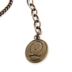 Q-pot. Parlor Jack-o’-lantern Macaron Necklace